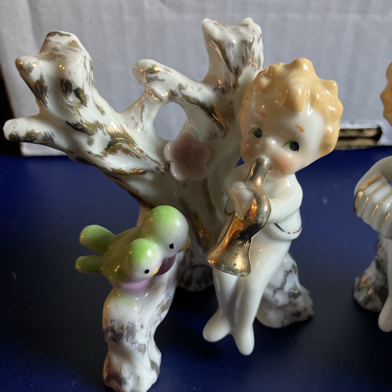 Two Vintage Cherubs Playing Instruments