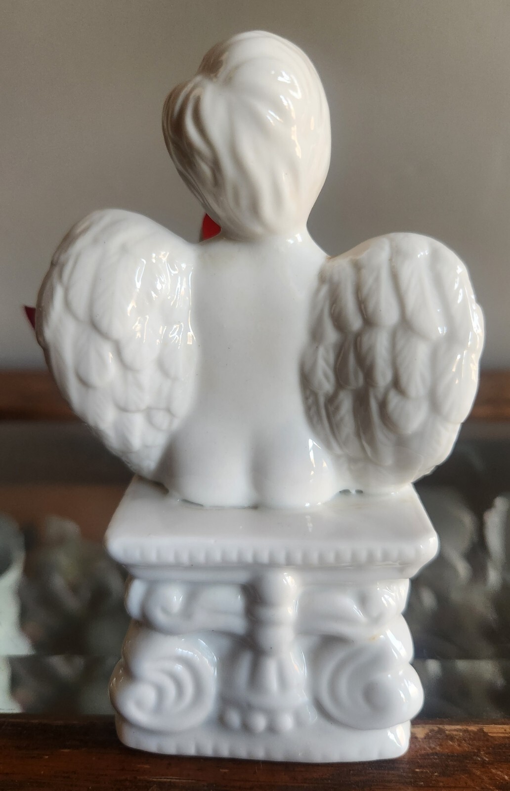 White Ceramic Cherub Angel Boy Figure Sitting On A Colum • 5″ Tall