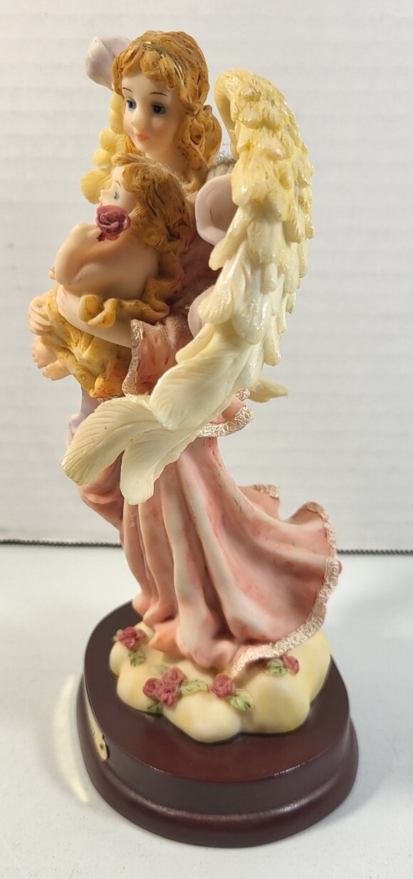 Vintage Del Elina Angel 8″ Figurine Turtle King Corp Holding Baby