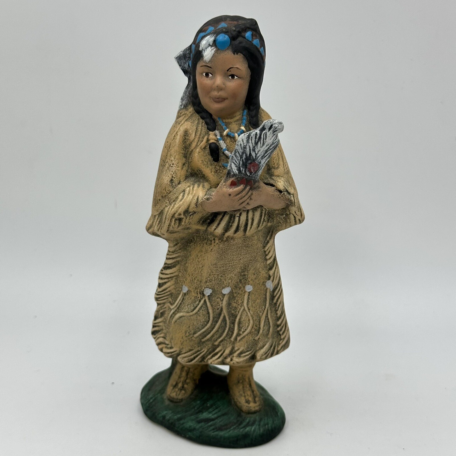 Indian Figurine Girl Holding Feathers