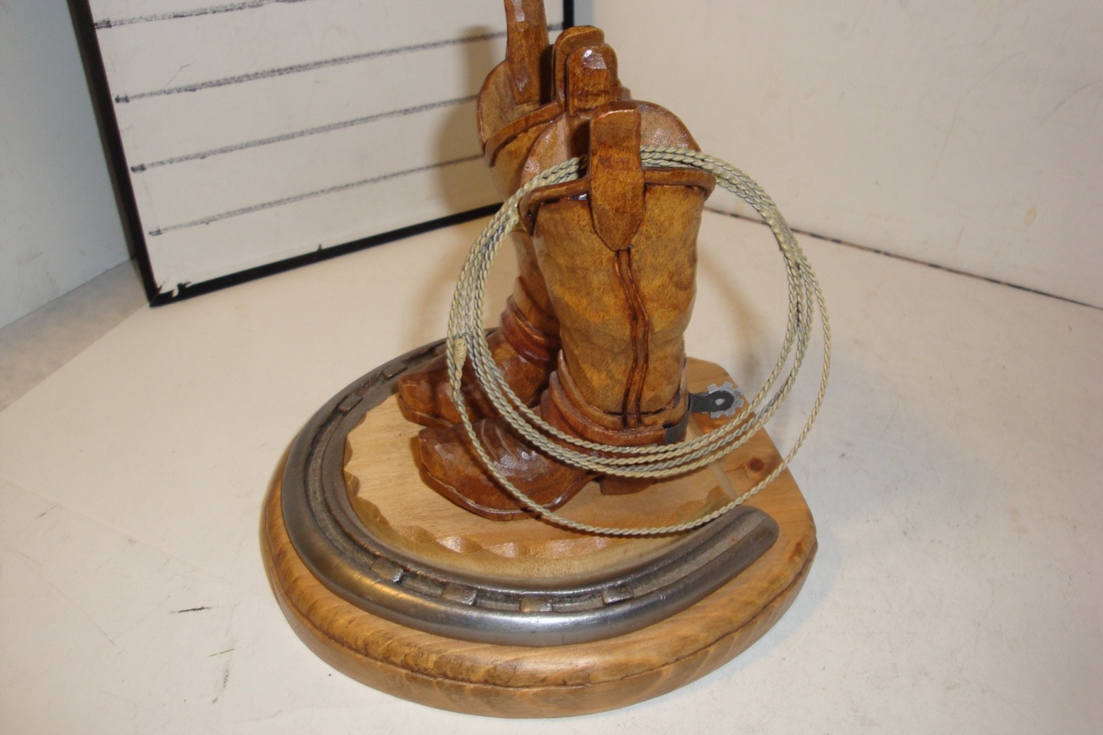 2012 J.L.Fritch wood carving cowboy boots and rope signed dated
