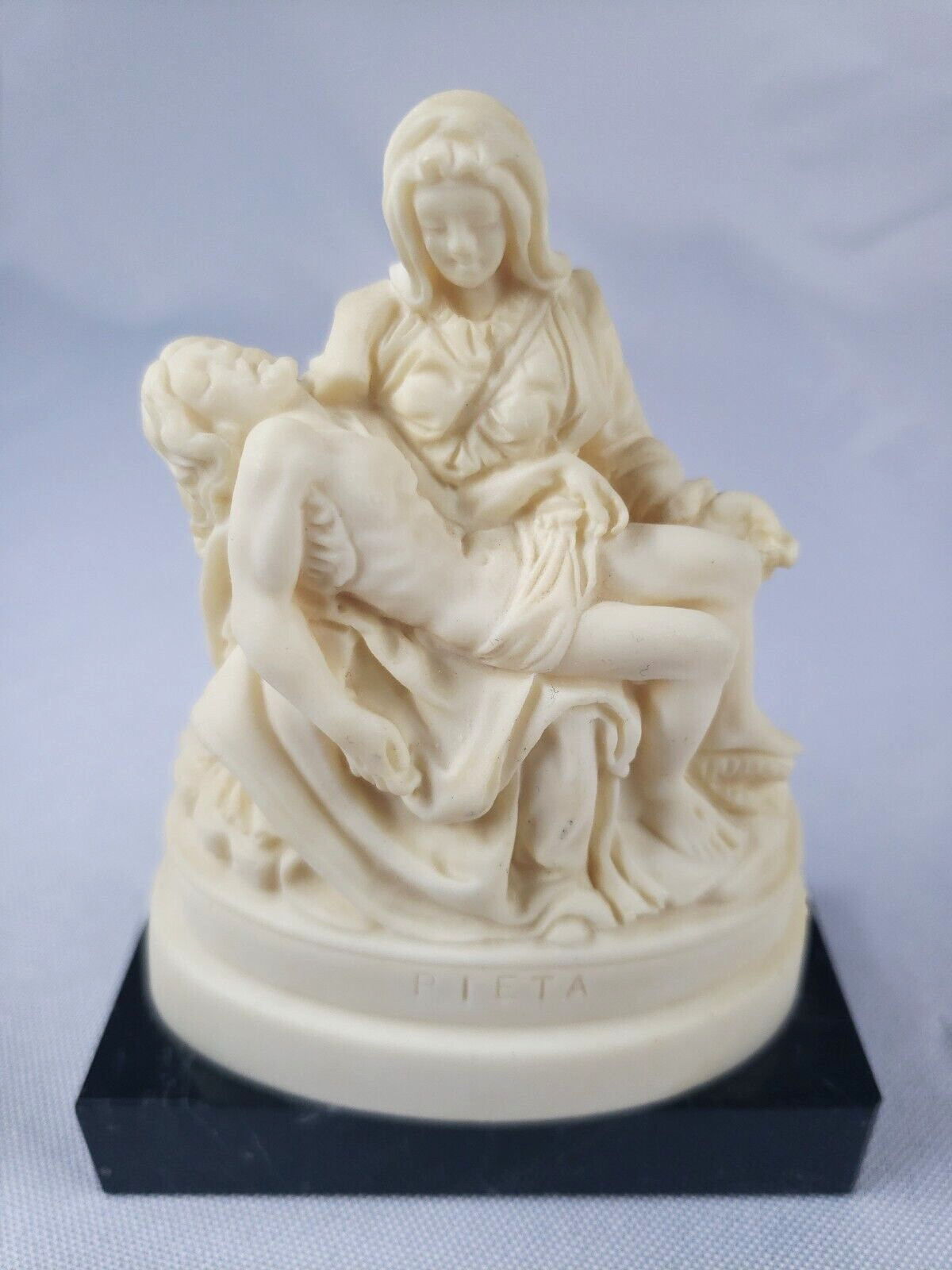 Michelangelo’s Pieta Stone Sculpture On Marble Base Signed