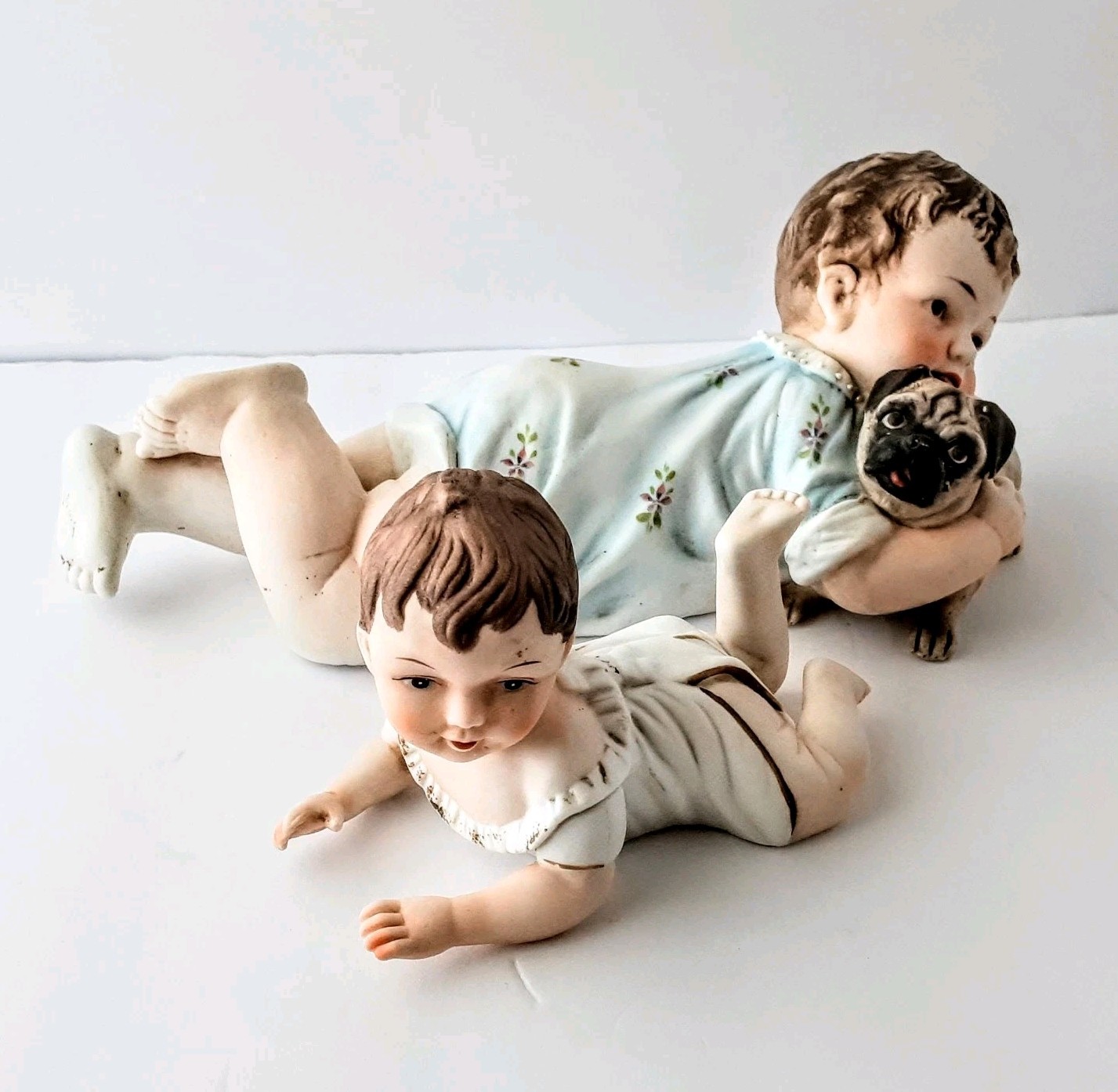 Set Of 2 Vintage Bisque Piano Babies – Lrg W A Pug & Smaller One Crawling