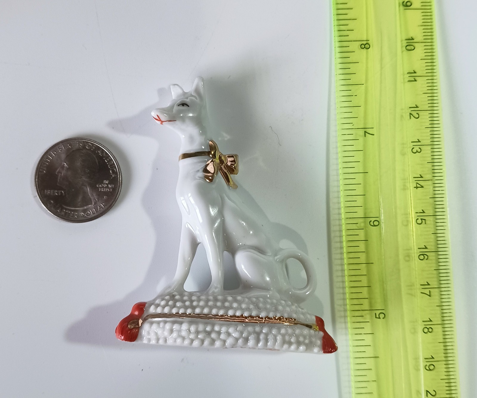 Vintage Germany Porcelain Figurine 2-7/8″: Egyptian Dog w/ Gold Bow