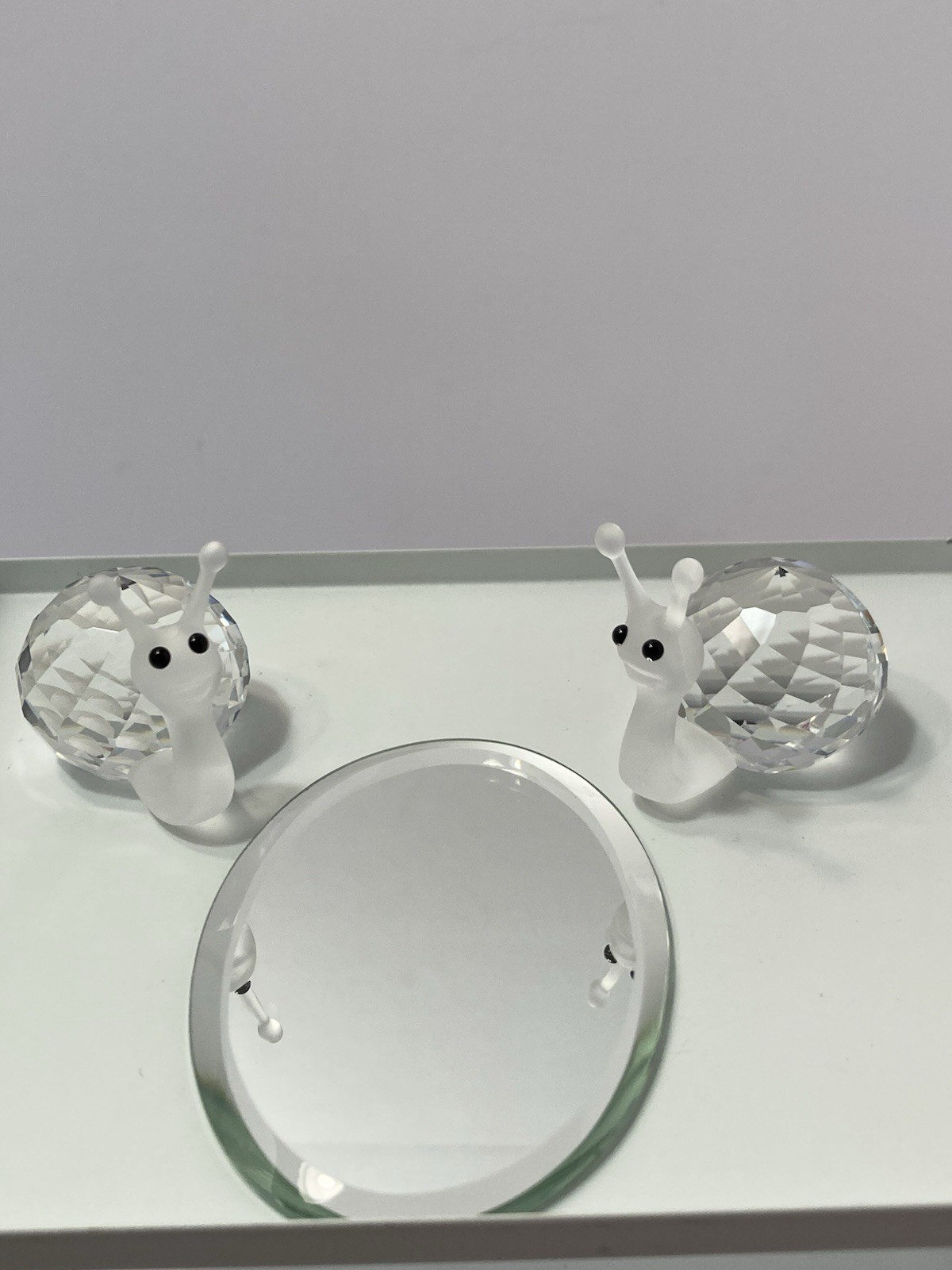 swarovski crystal small snail figurines (2)