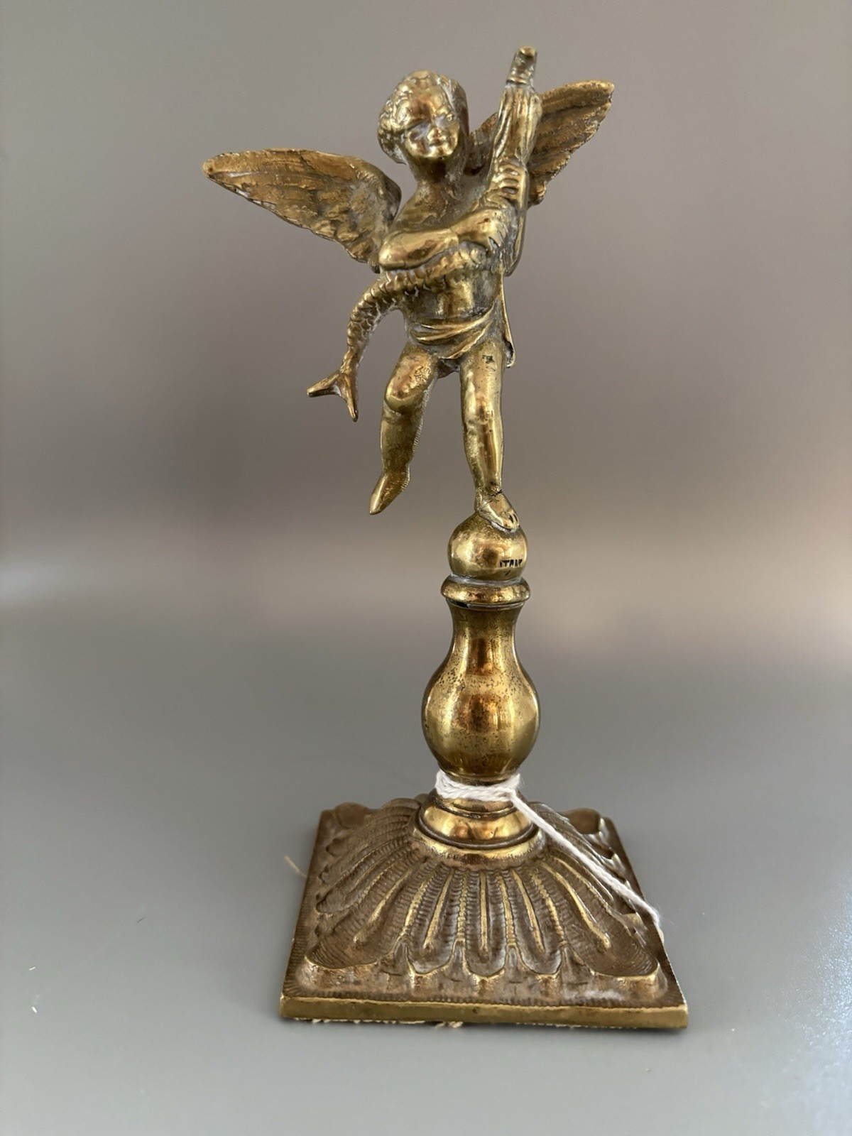 1930’s Era Cherub Angel Holding The Body Of A Fish With The Head Of Eagle, Brass