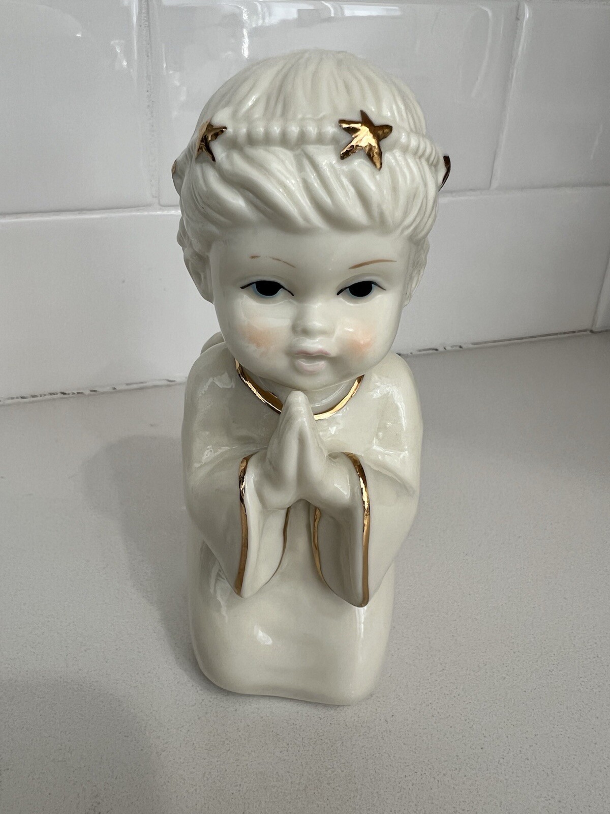 Praying And Kneeling Angel White Ceramic With Gold Accents.