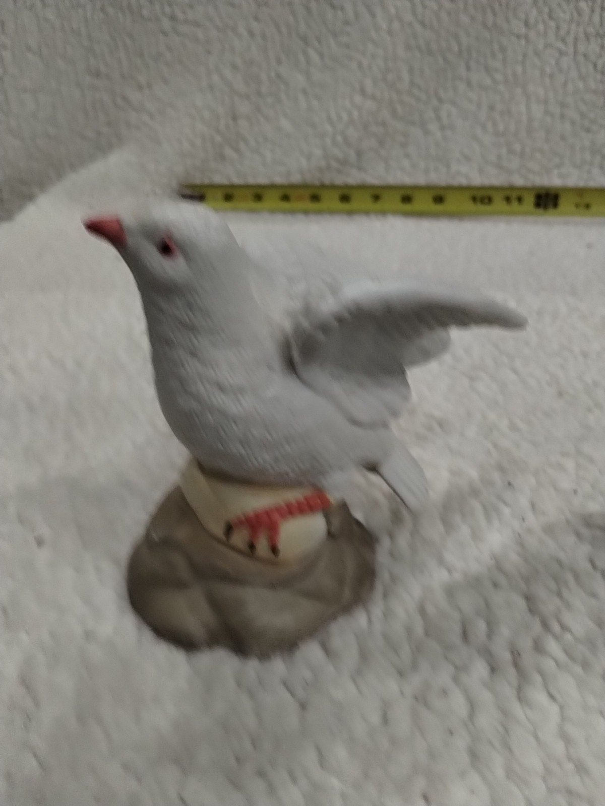 Two Ceramic Doves Wings Back With Red And Green Flowers.