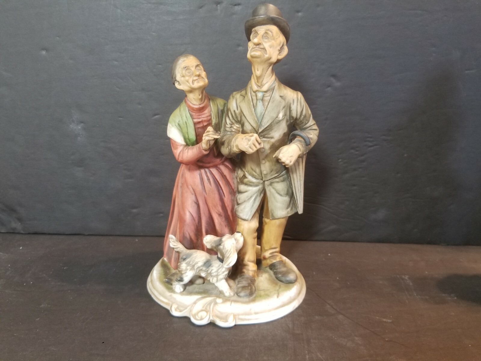 Old Couple Walking Dog Figurine, 9 1/2″ H