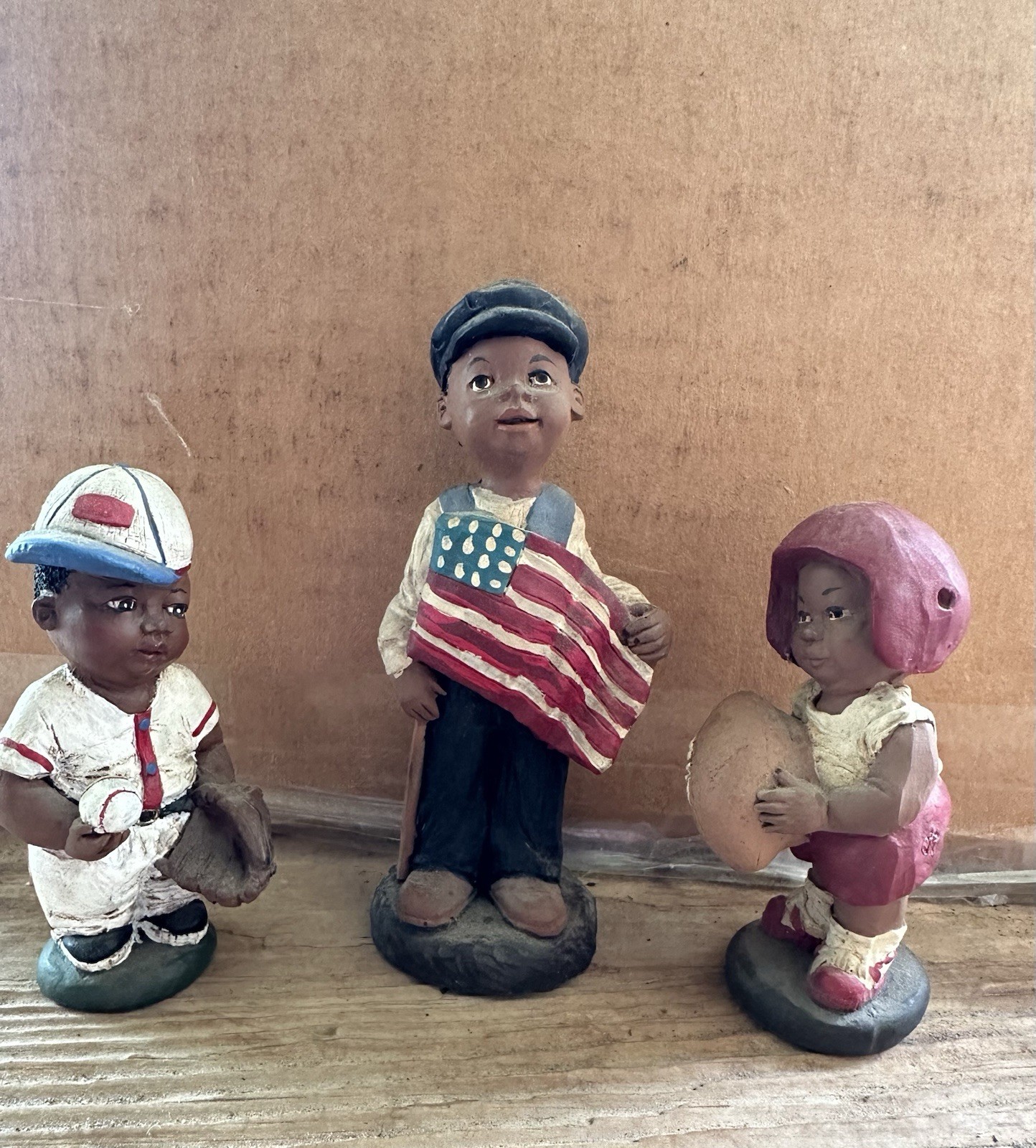 Set Of 3 Figurines. Baseball Player And Football Player, Boy With Flag