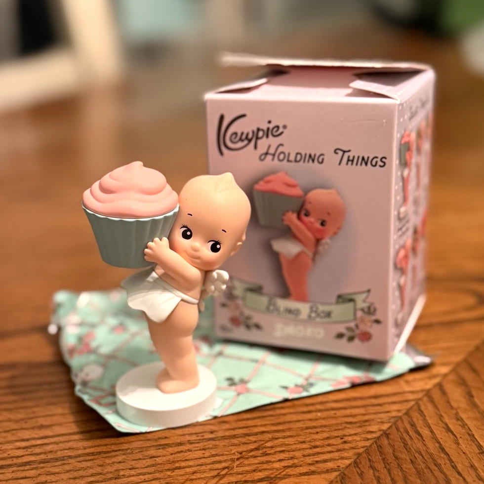 Smoko Kewpie Holding Things Cupcake Figurine