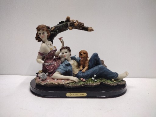 Giovanni Collection Sculpture. Lady And Man With Dog At Picnic Nesting Birds.