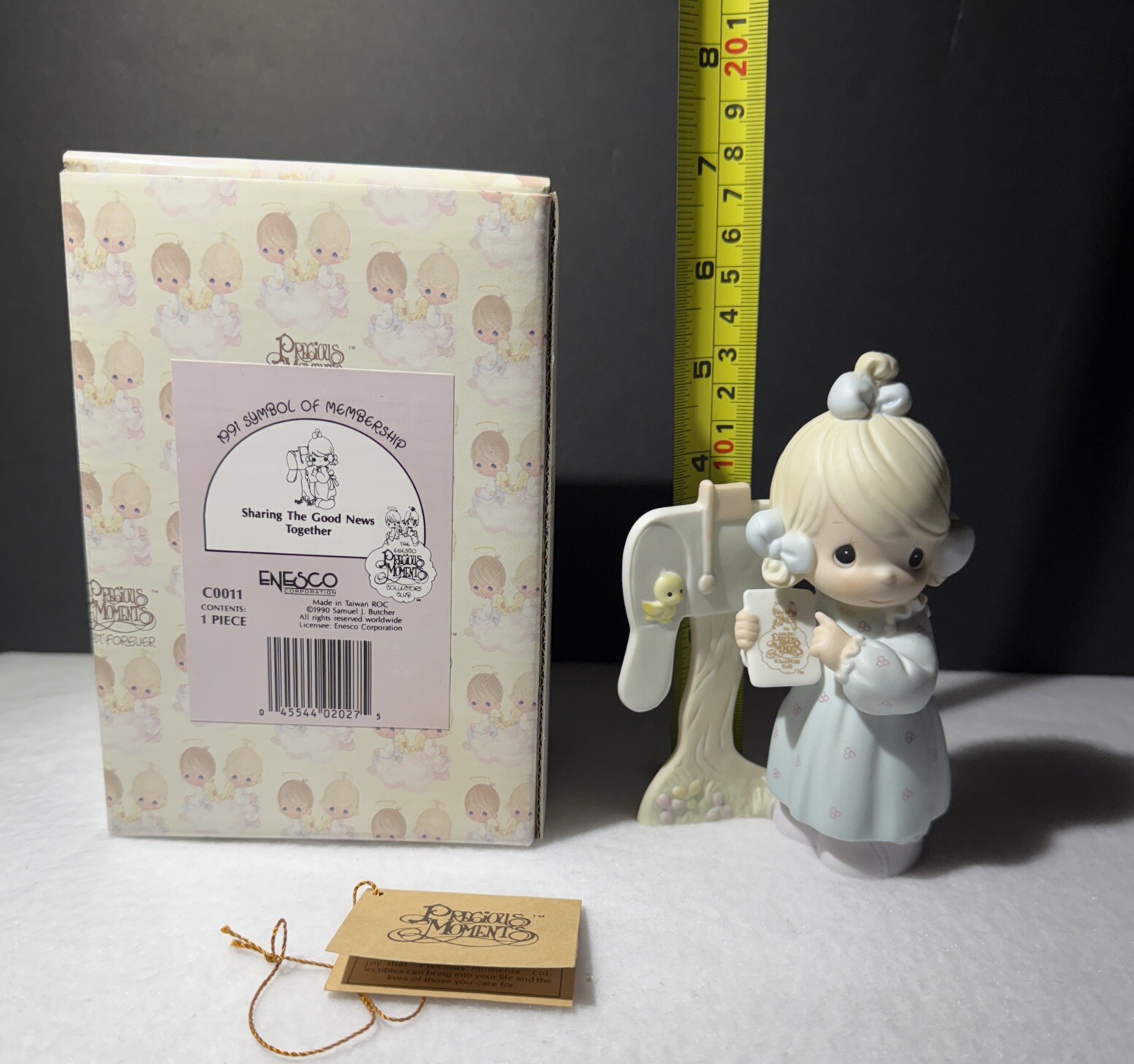 Precious Moments Figurine – Sharing The Good News Together -1991 Symbol Member..