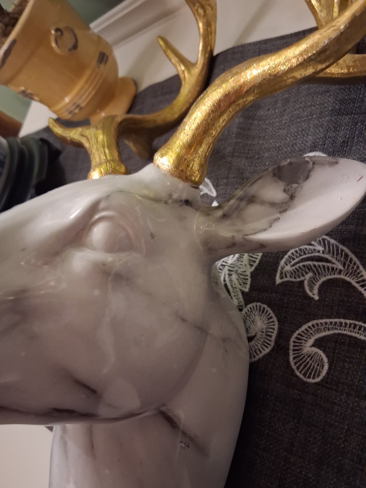 White Marbled Deer Head Hangs On Wall With Gold Antlers About 18″ Tall