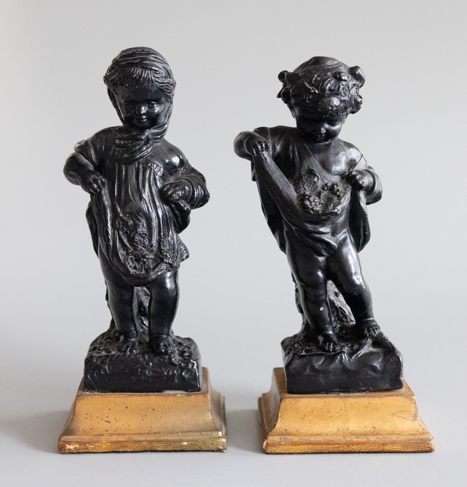 Set of Two Italian Borghese Black & Gold Plaster Cherubs Putti Figurines c. 1930
