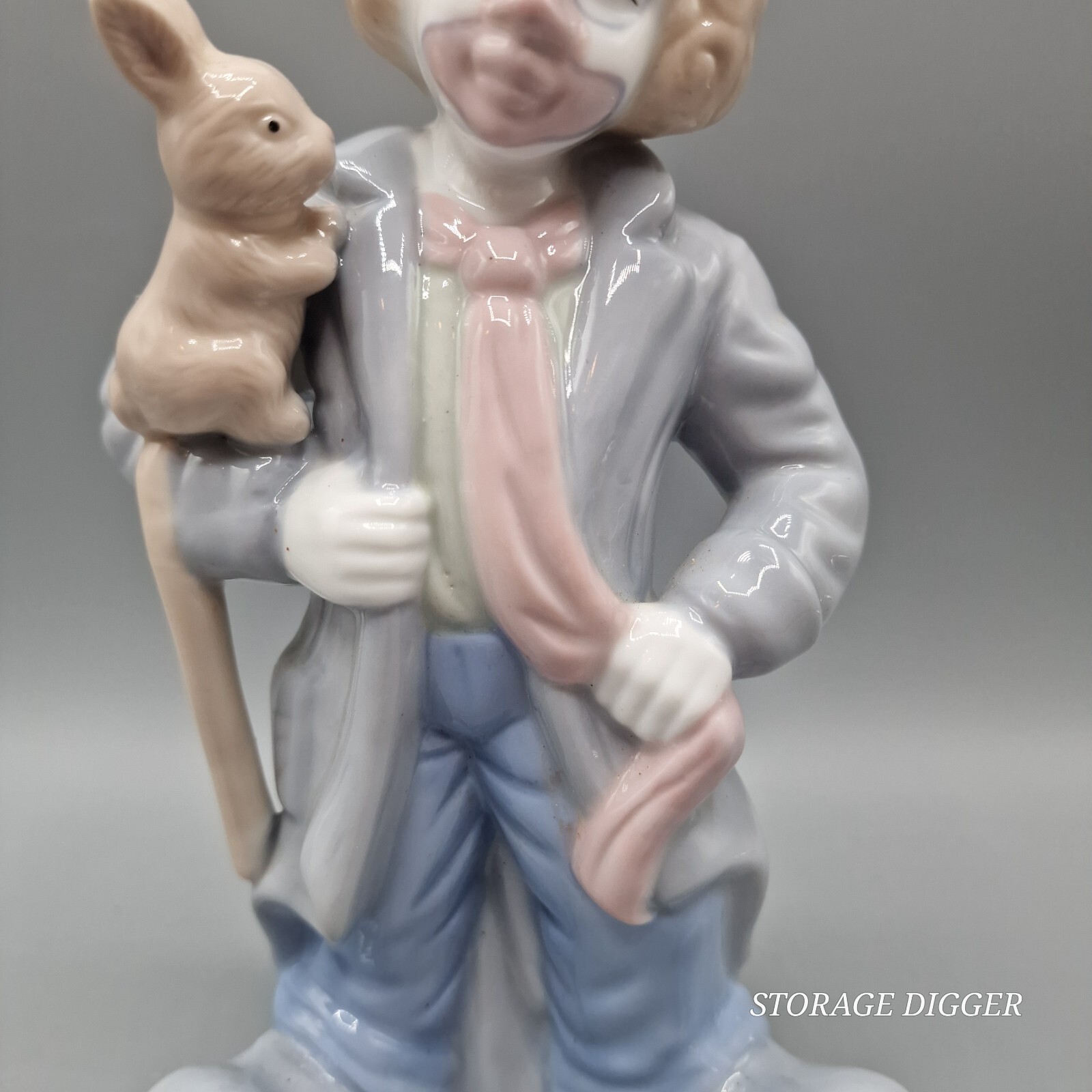 Vintage Blue Gray Brown Porcelain Clown with Rabbit Figurine 9.5″ Tall
