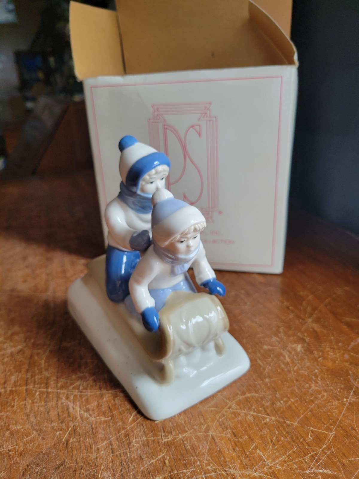Vintage Paul Sebastian Porcelain Mexico Children Sledding Winter Snow Tobaggan.