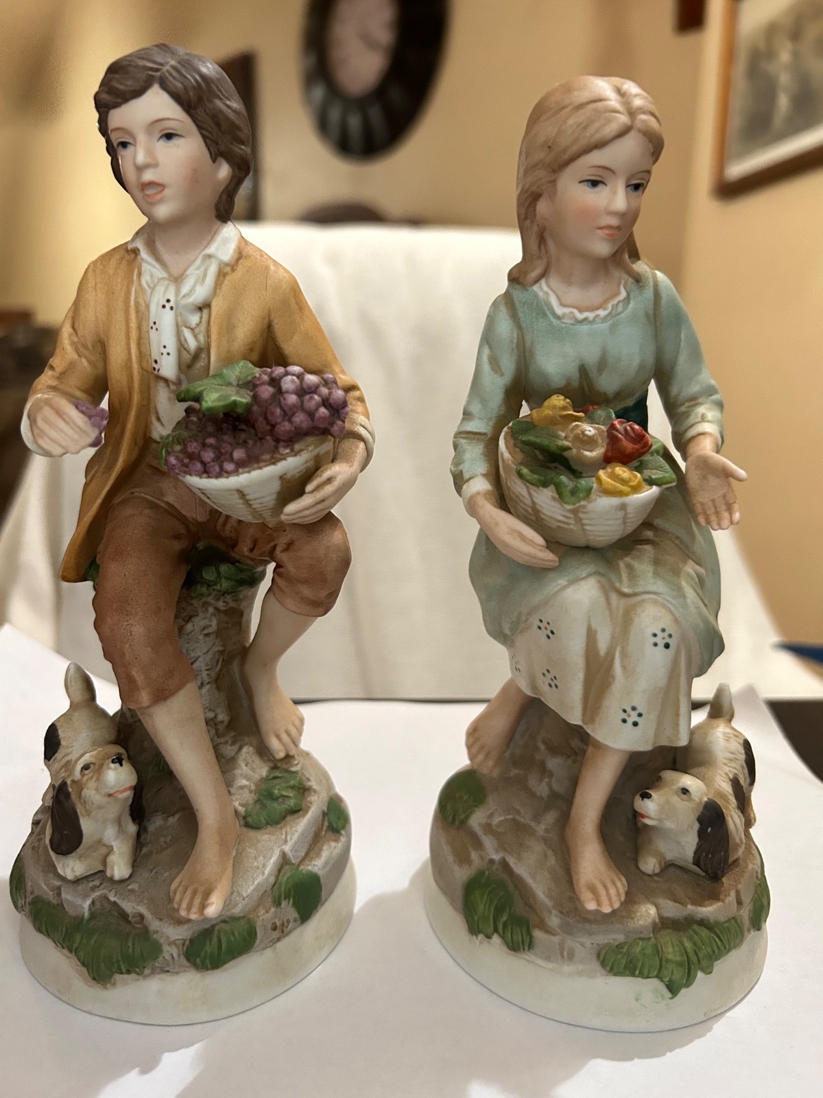 Homco figurines, boy and girl with harvest baskets, with dogs 1408 set