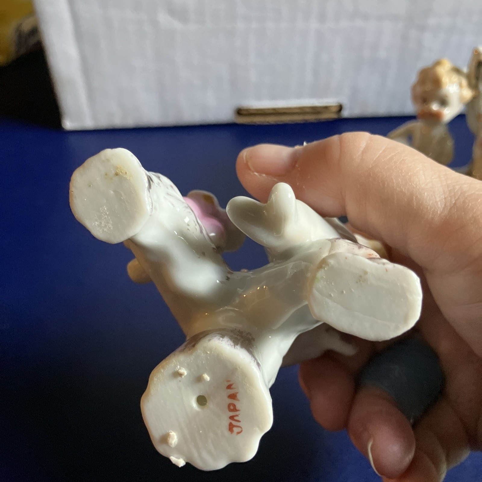 Two Vintage Cherubs Playing Instruments
