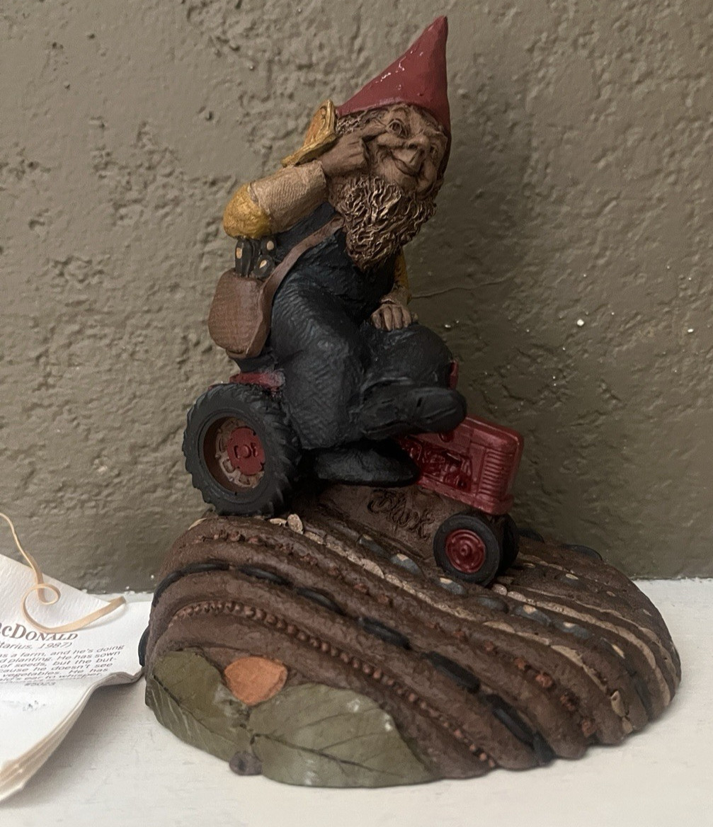 CAIRN STUDIO TOM CLARK GNOME “MACDONALD” ON TRACTOR IN FIELD #67 – 1987