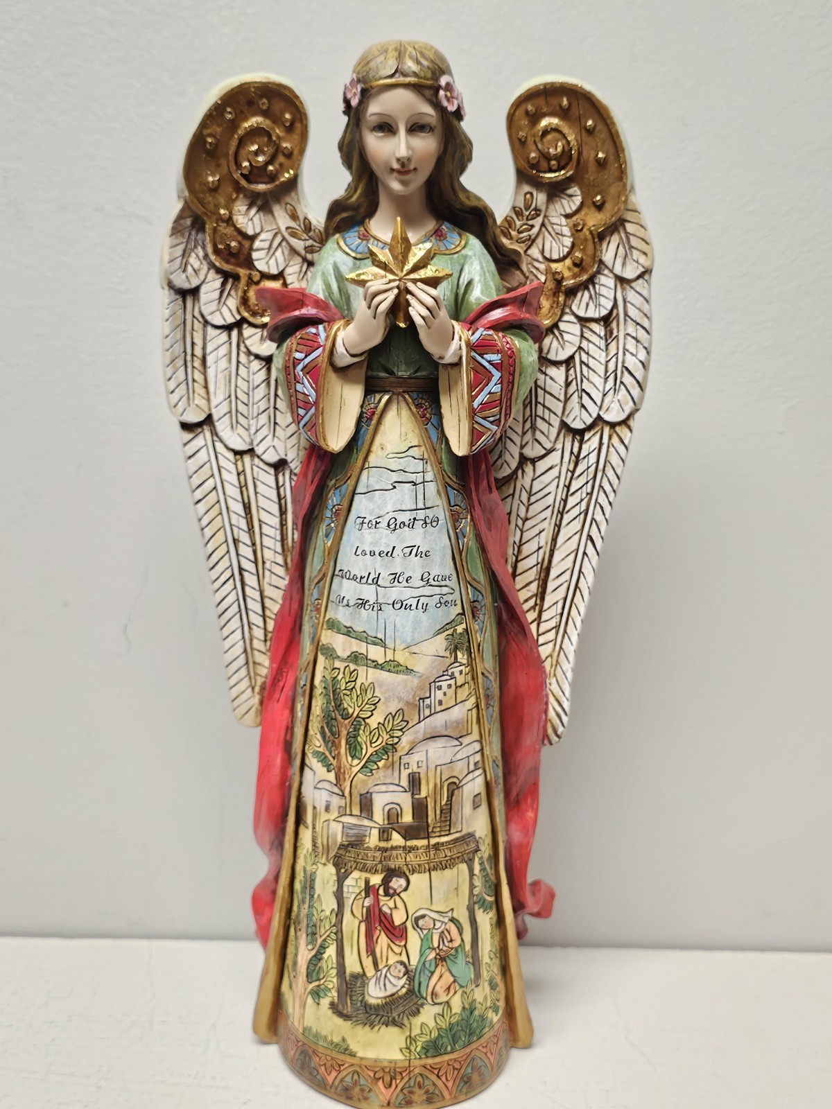 Joseph’s Studio By Roman – Angel Figure Holding Star with Holy Family in Skirt,