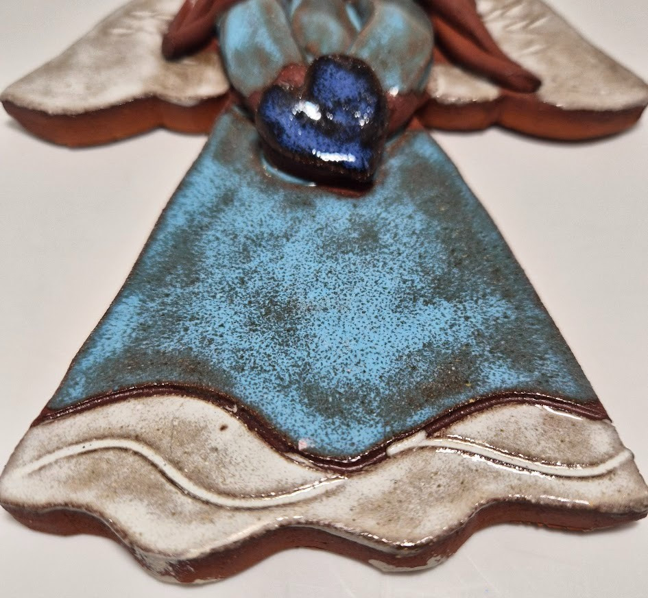 Handmade ceramic angel wall hanging