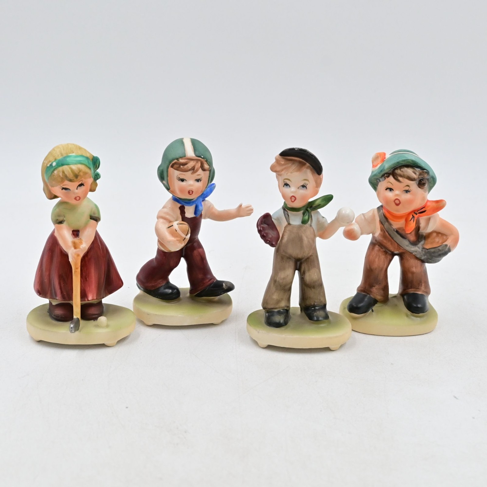 Napcoware Sports Figurines Football, Golf, Baseball Bundle Of 4