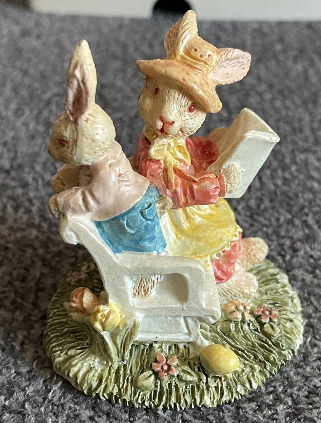 Female Rabbit Reading Book On Bench with Child Rabbit Figurine