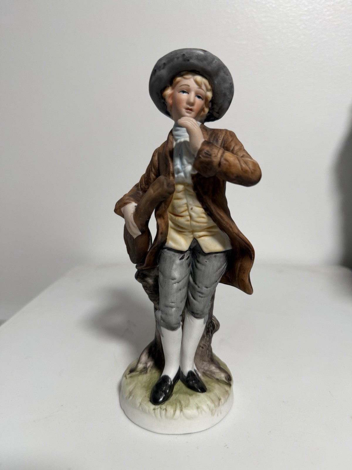 Vintage Porcelain Figurine Of Colonial Man In Detailed Attire