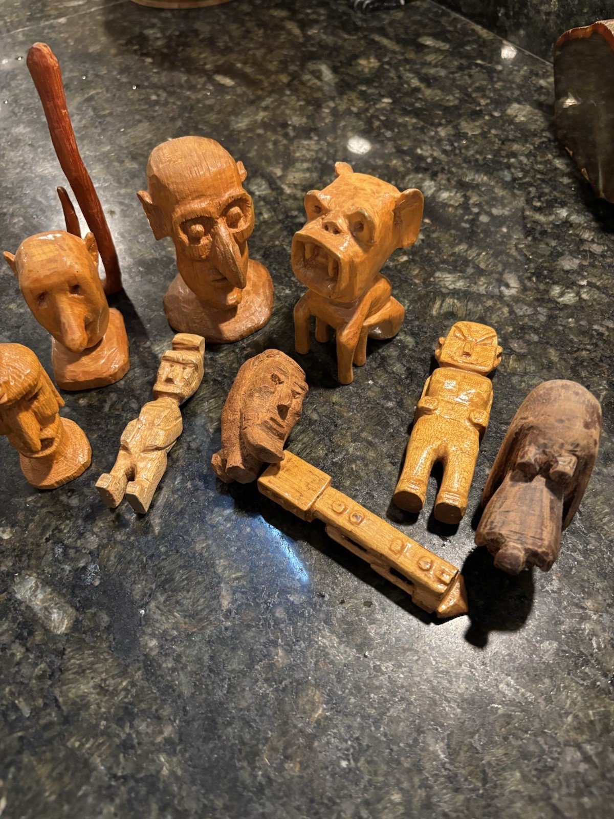 small carved wooden Figures