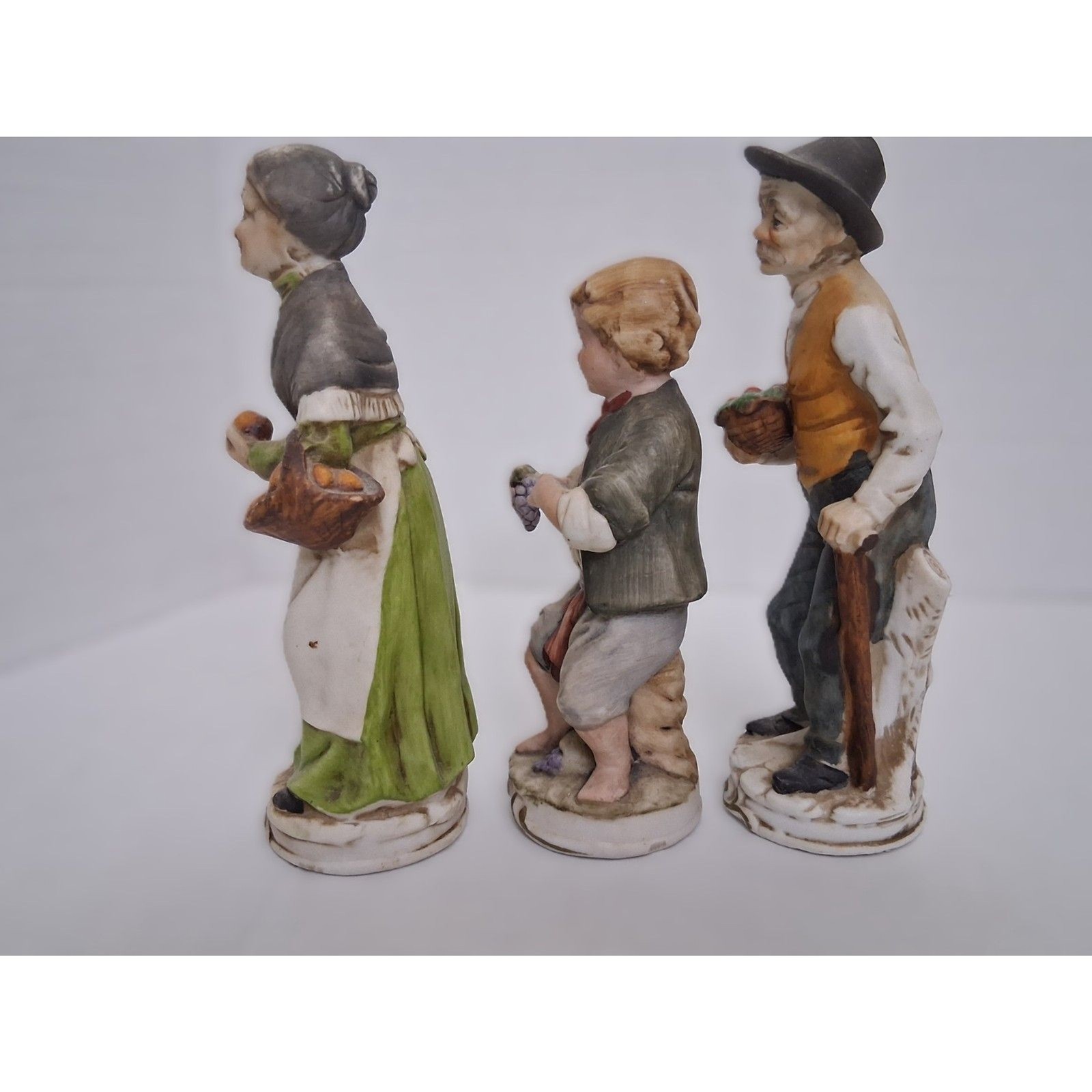 Old World Farmers Man Woman Boy Vintage 20th Century Bisque Porcelain Figurines