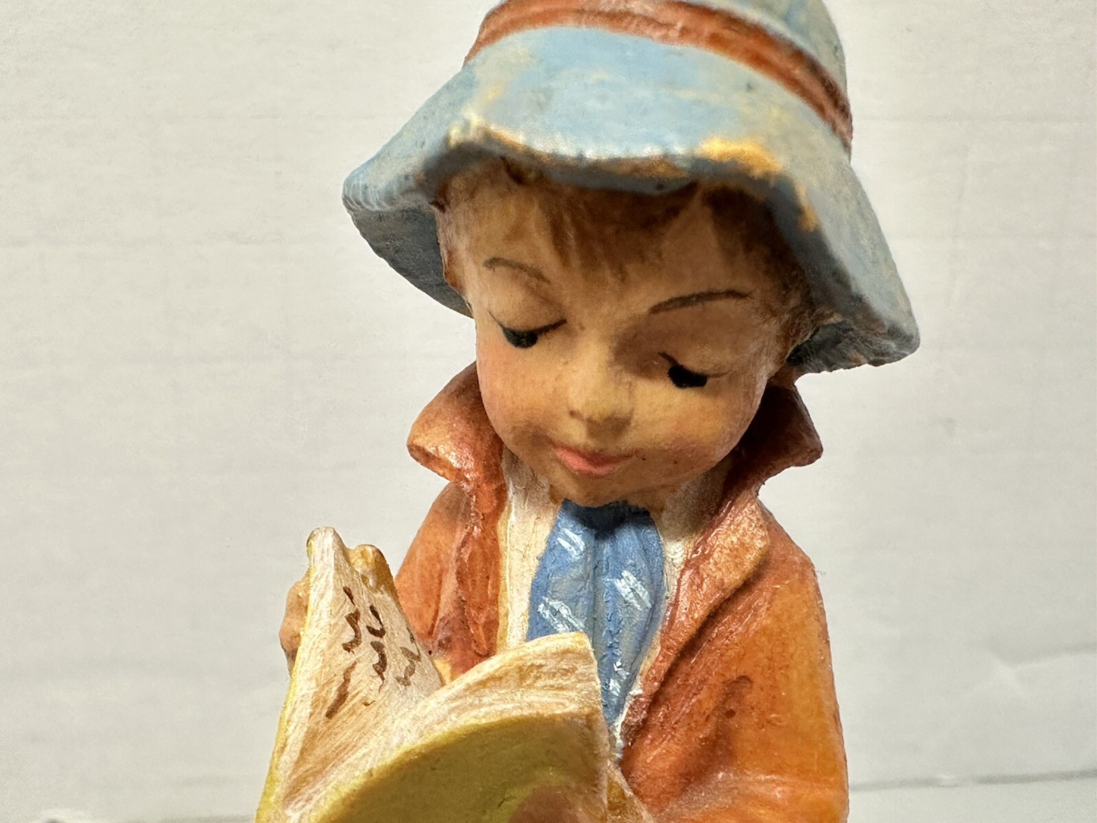 Vintage ANRI Wood Carved Small Boy Wearing Hat & Reading Newspaper 3.7″ tall