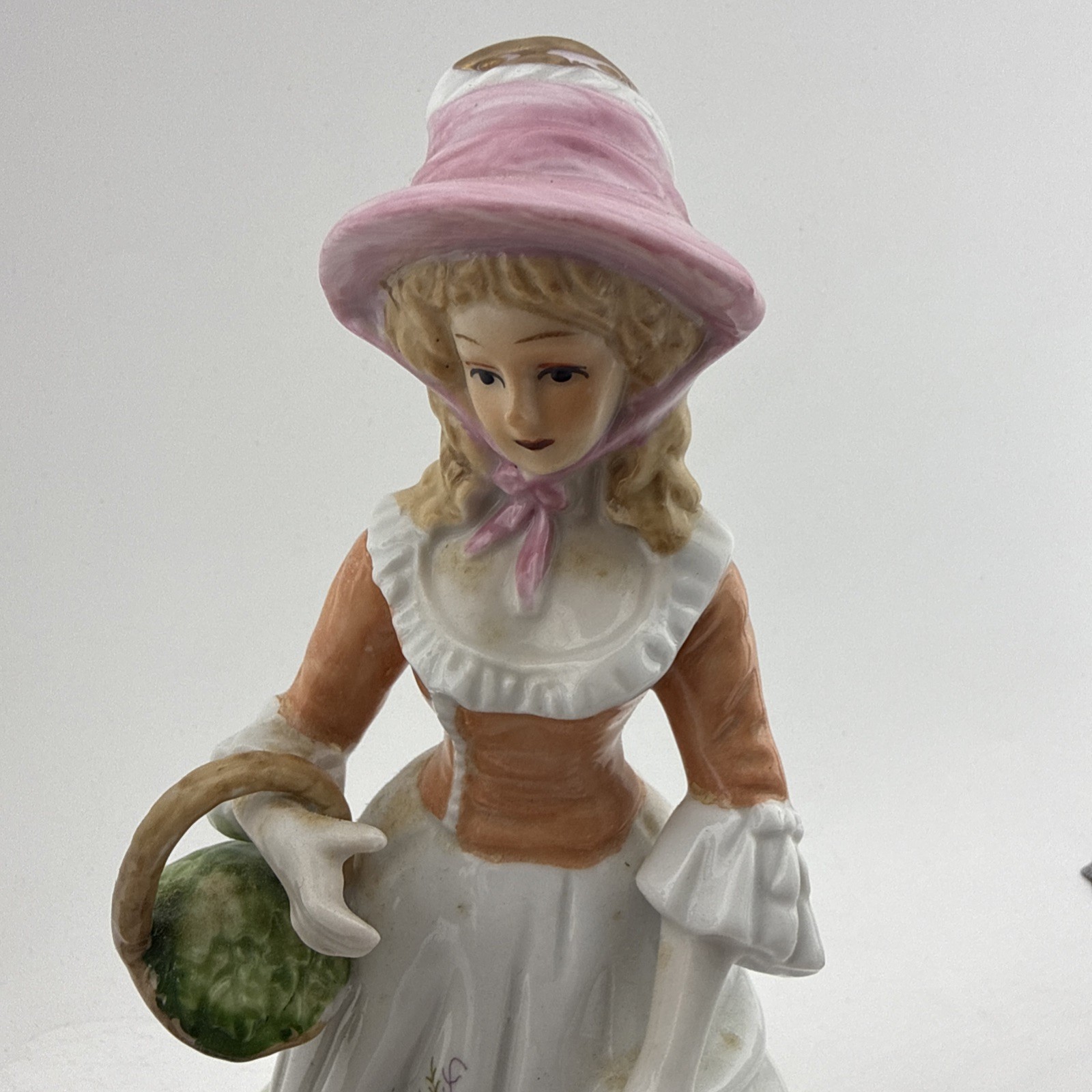 Vintage Colonial Porcelain Couple Figurines Man Bird Woman Basket
