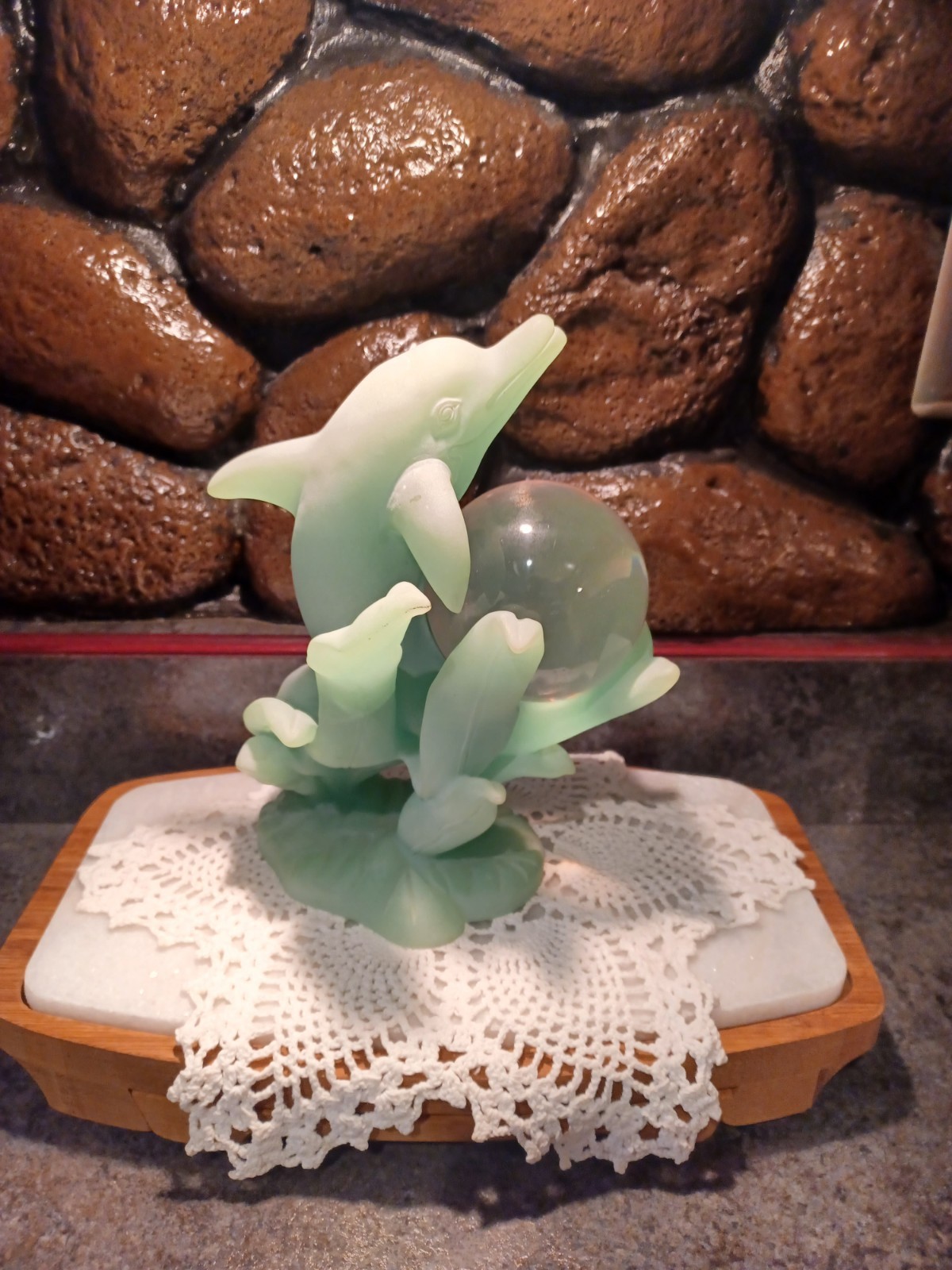 dolphin figurine with crystal ball that glows in the dark
