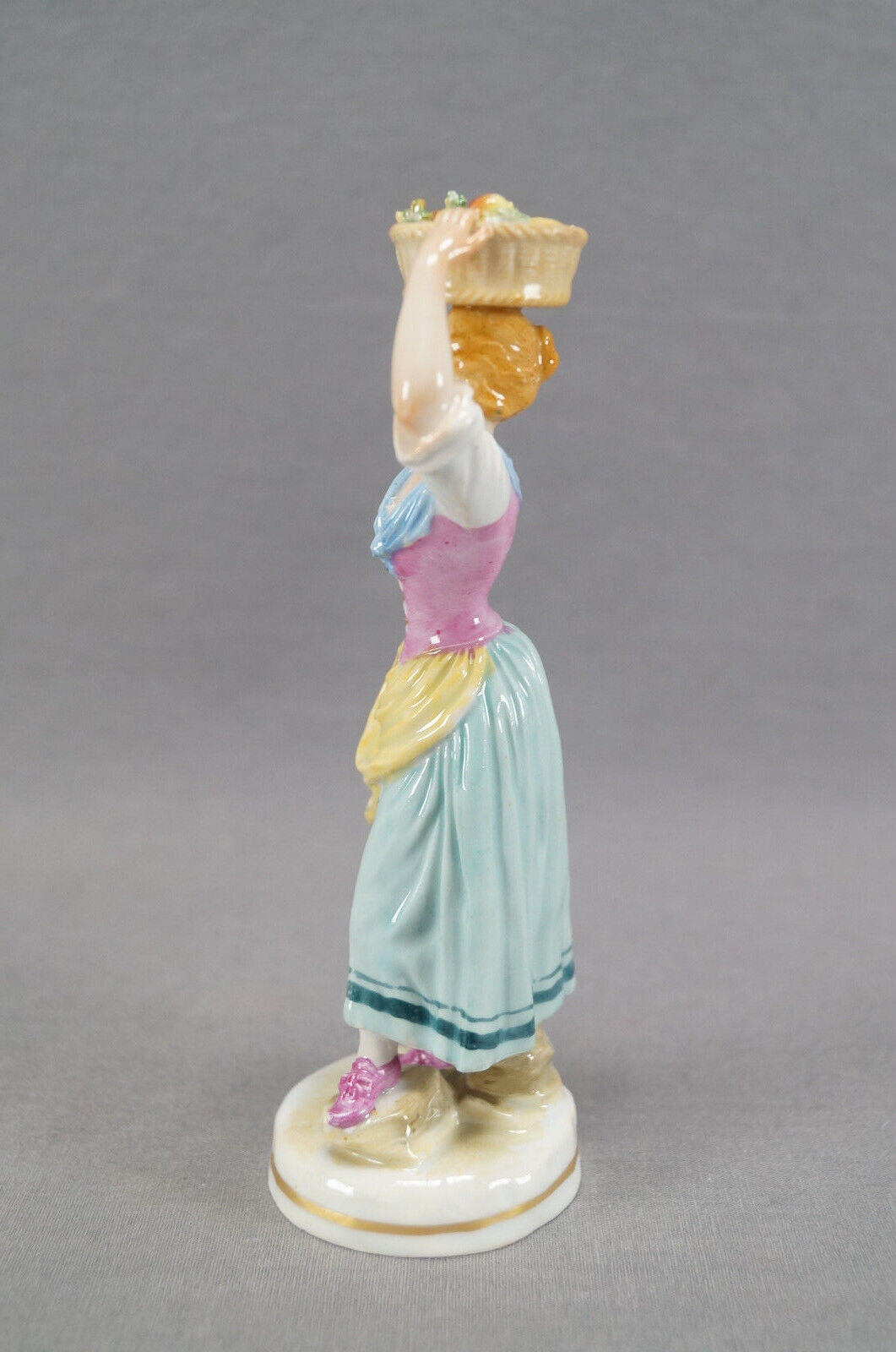 Early 20th Century Dresden Hand Painted Turnip Seller Female Porcelain Figurine