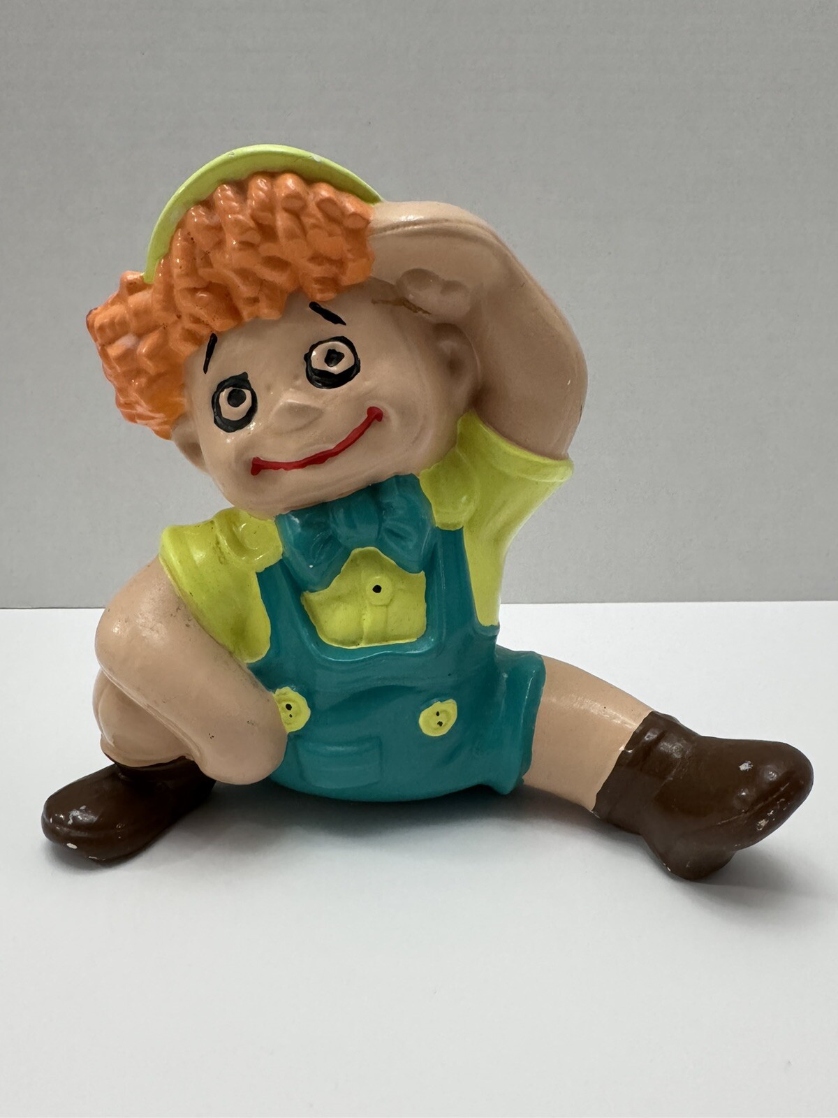 Vintage Raggedy Andy ceramic figurine, likely produced from a 1970s Byron Mold.