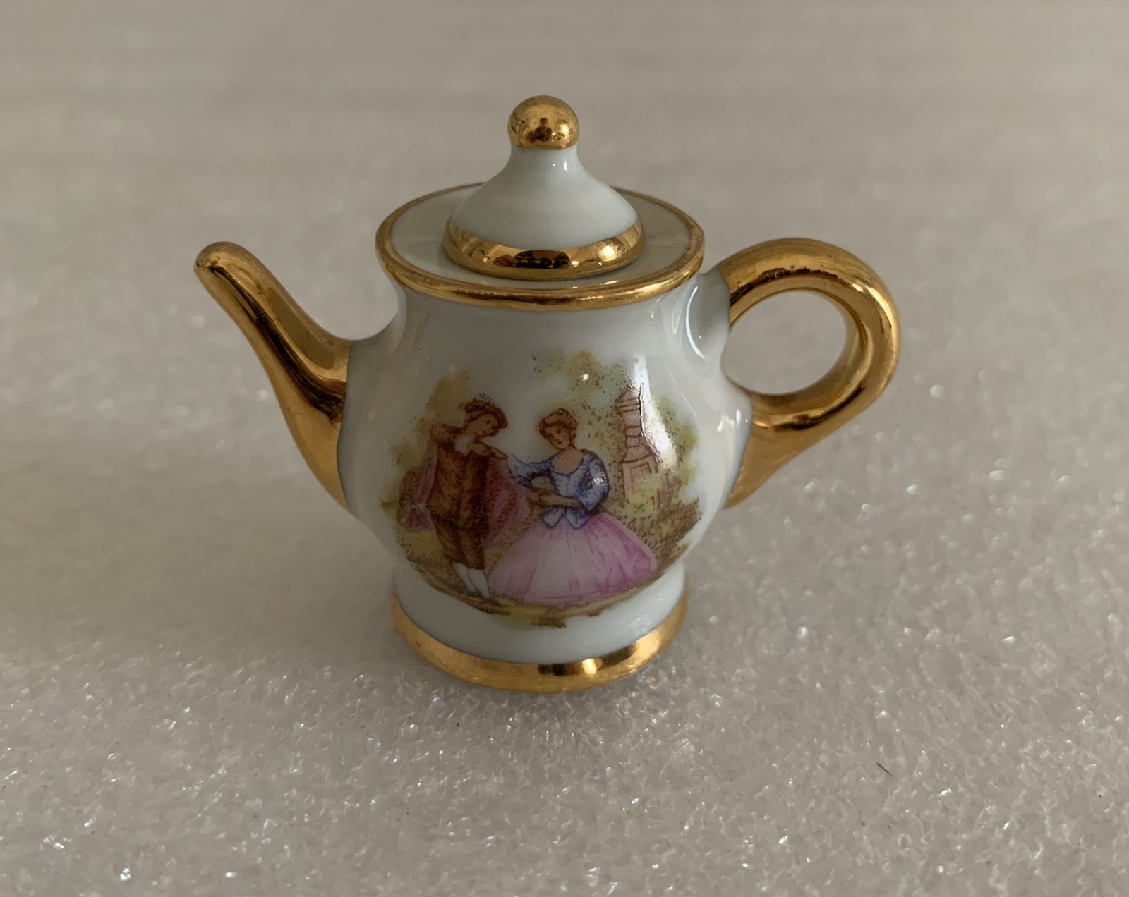 Vtg. Porcelain Miniature Teapot Limoges France Courting Couple Rose Gold Trim