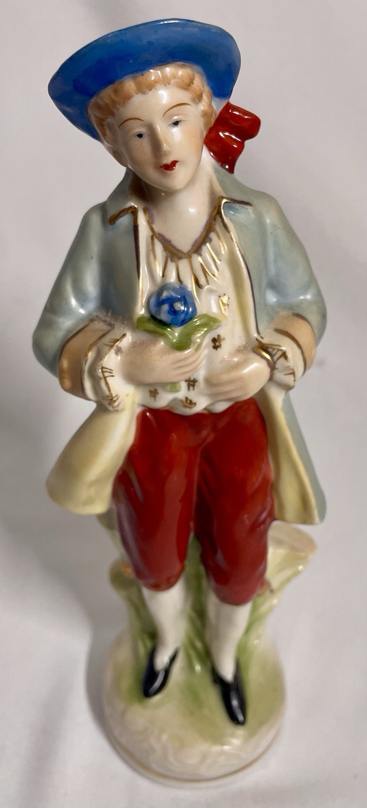 Porcelain Figurine Made Handpainted Japan Colonial Man Holding Flower 8 in H