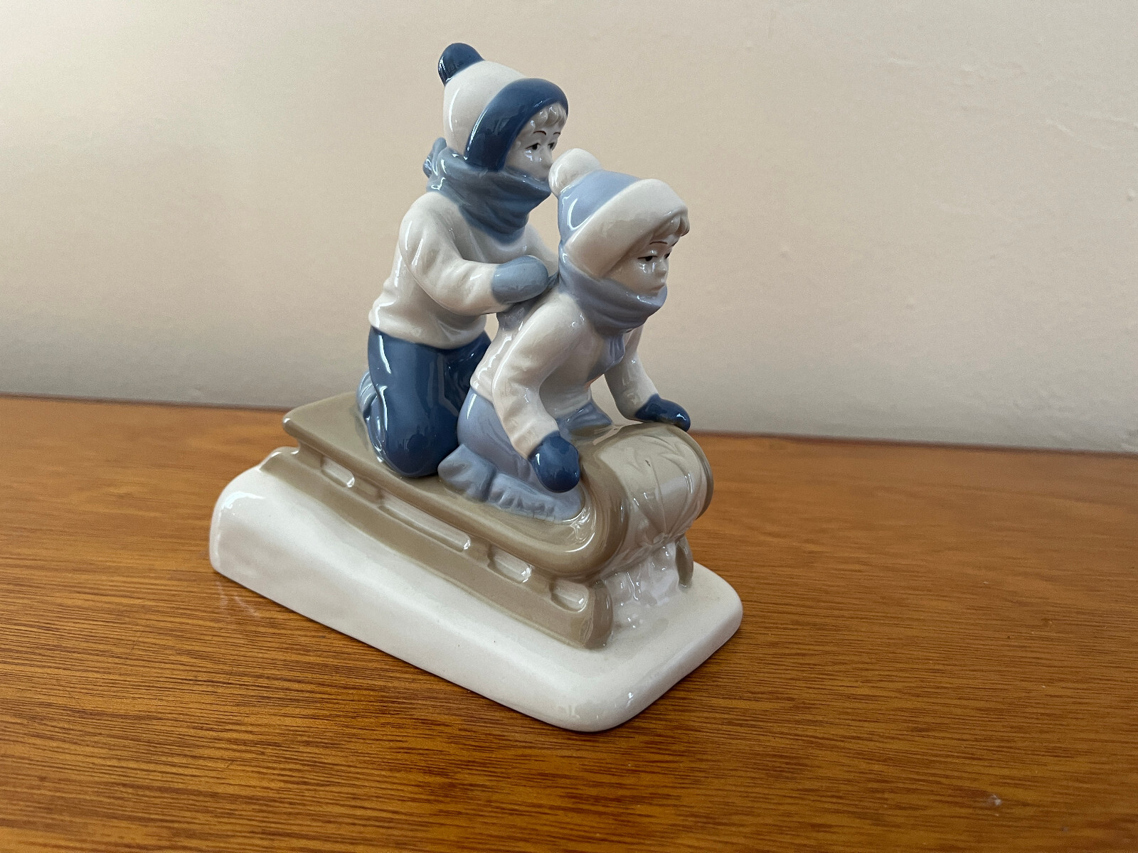 PAUL SEBASTIAN CUERNAVACA 2 KIDS SLEDDING FINE PORCELAIN FIGURINE