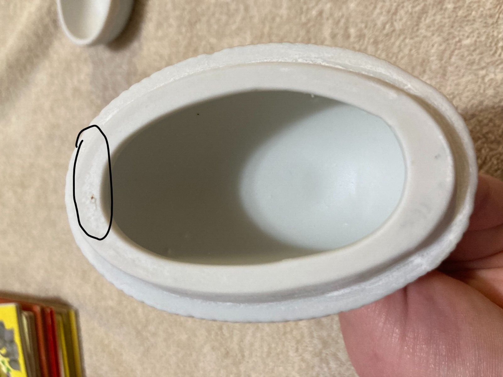 White Rabbit Holding onto Yellow +Green Egg 2 piece Egg that is Blue (Flawed)
