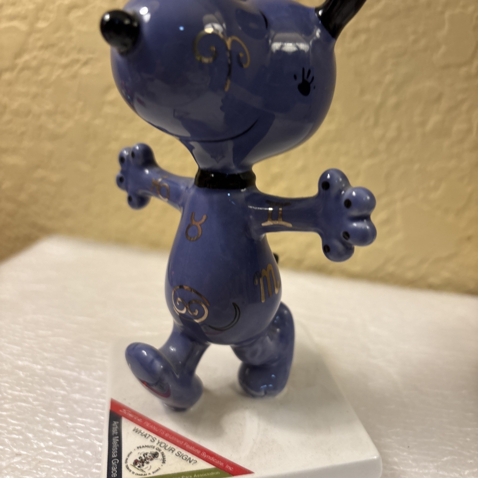 Westland Peanuts On Parade Snoopy What’s Your Sign? 8412 5.1/4” Purple