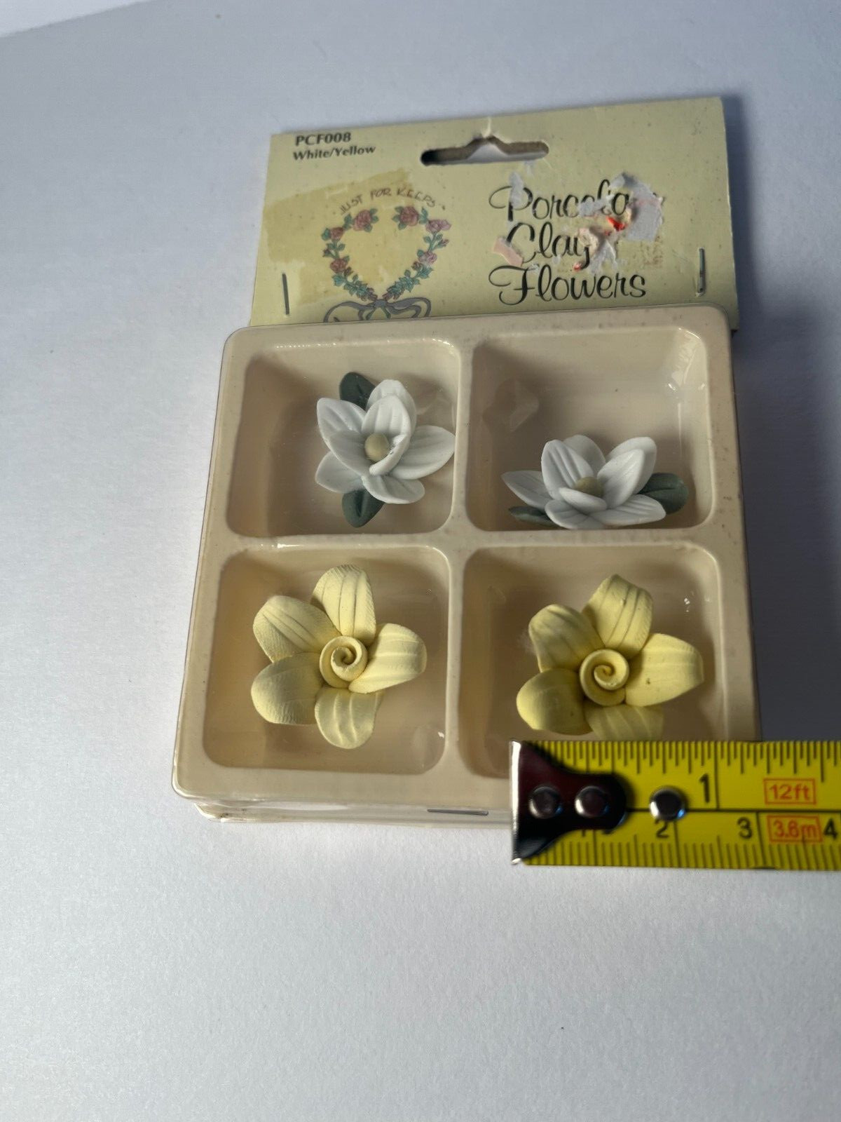Porcelain Clay Flowers Wang Intl Inc. 1989