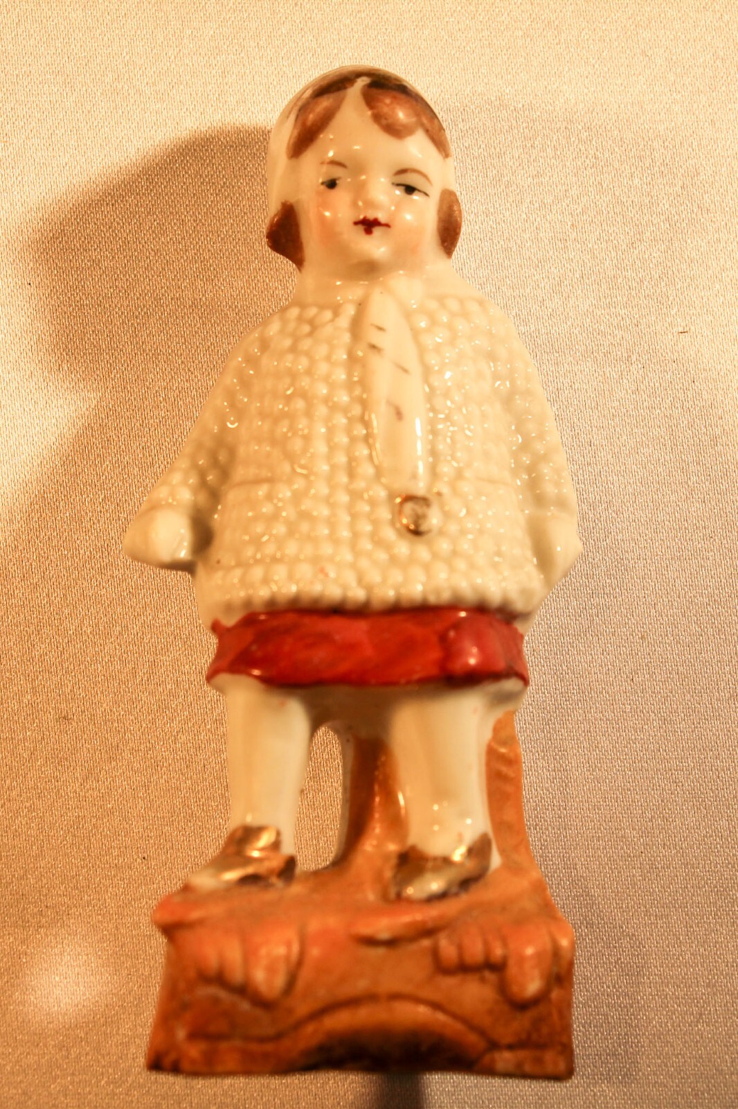 vintage Girl in knit coat porcelain figurine 3.75″ Germany
