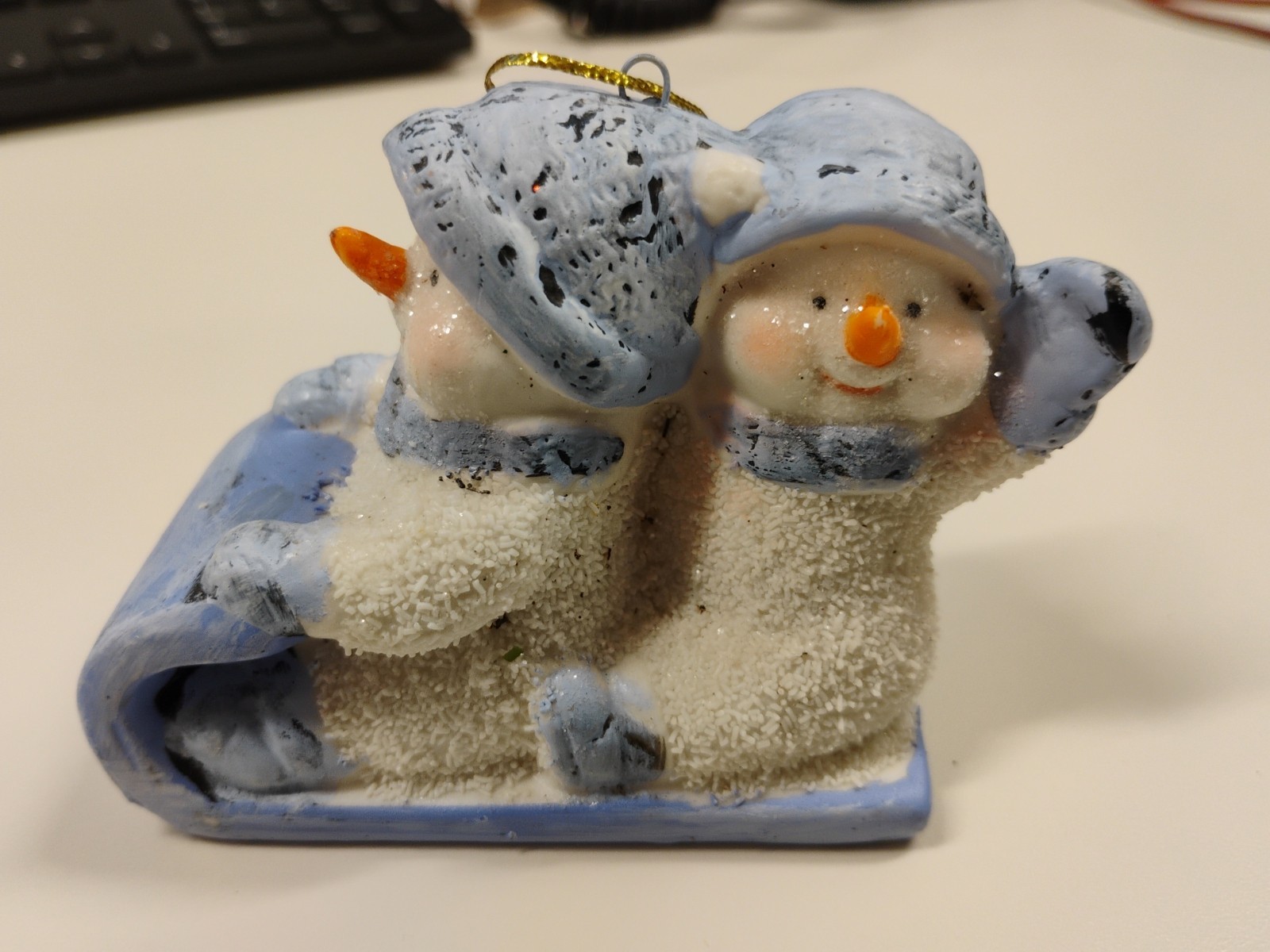Snowman Riding Toboggan Figurine : Two Snowmen Wearing Hats, Scarfs, & Mittens