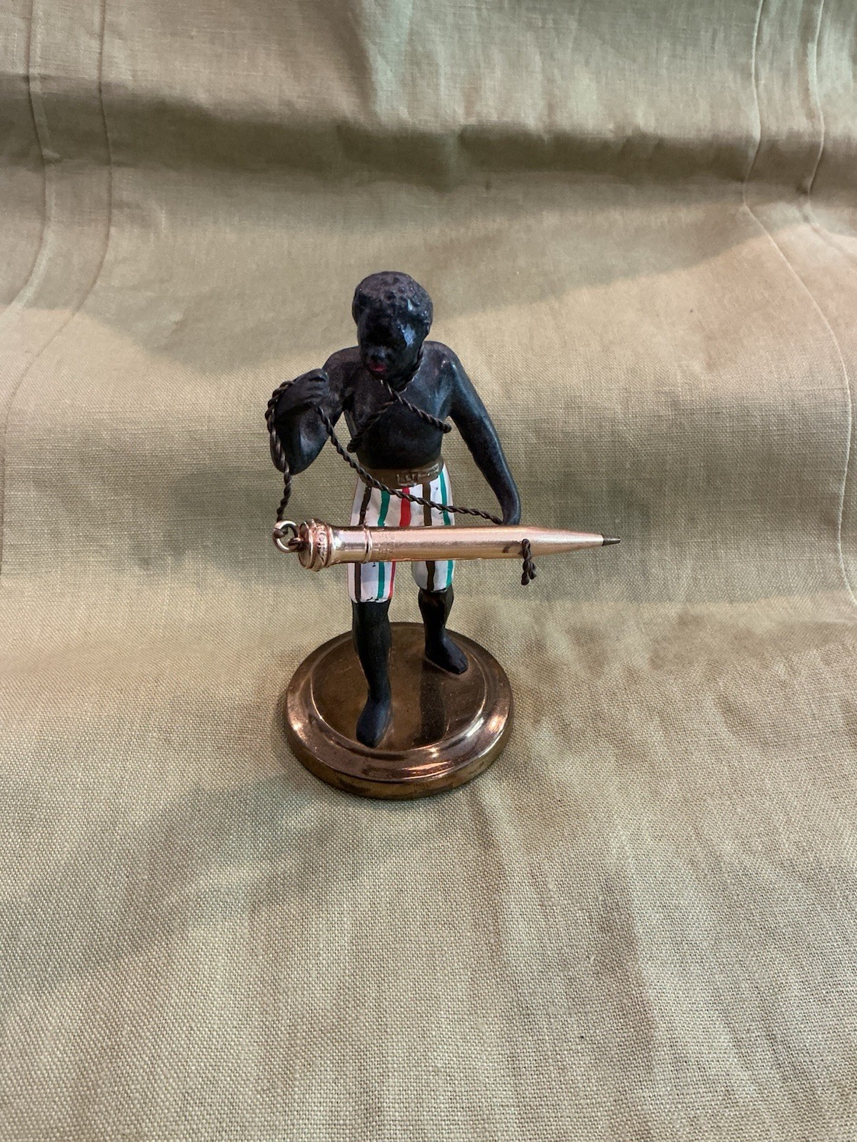 Vintage Blackamoor Nubian Figure Statue Holding A Gold Filled Pencil.