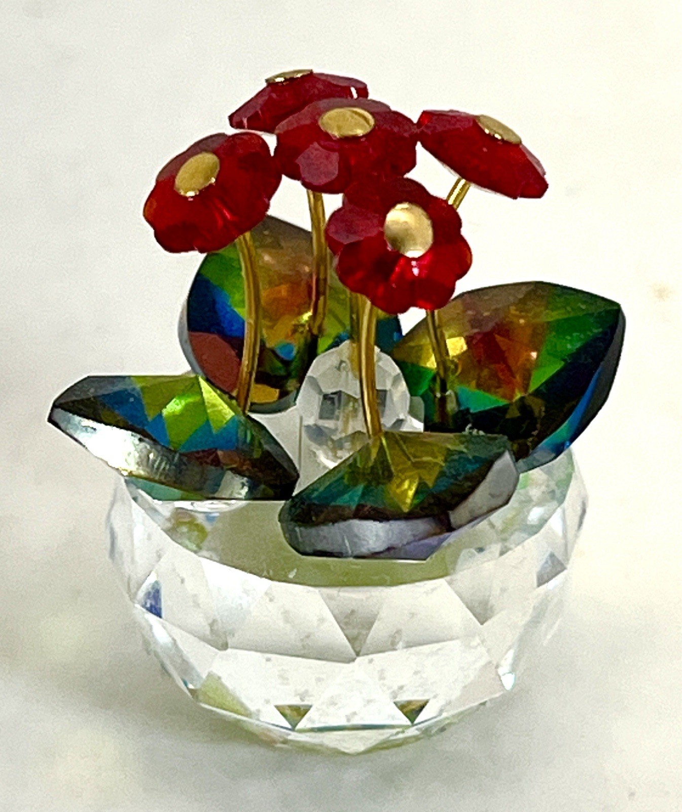 Red Crystal Flowers with Crystal Green Leaves In a Decorative Crystal Vase