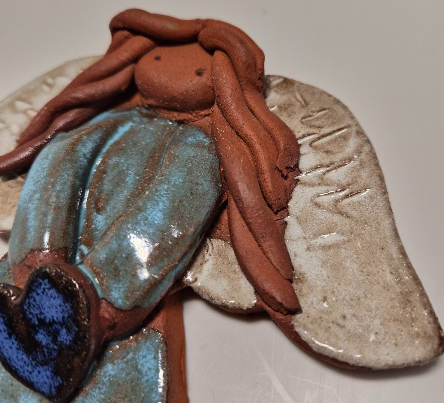 Handmade ceramic angel wall hanging