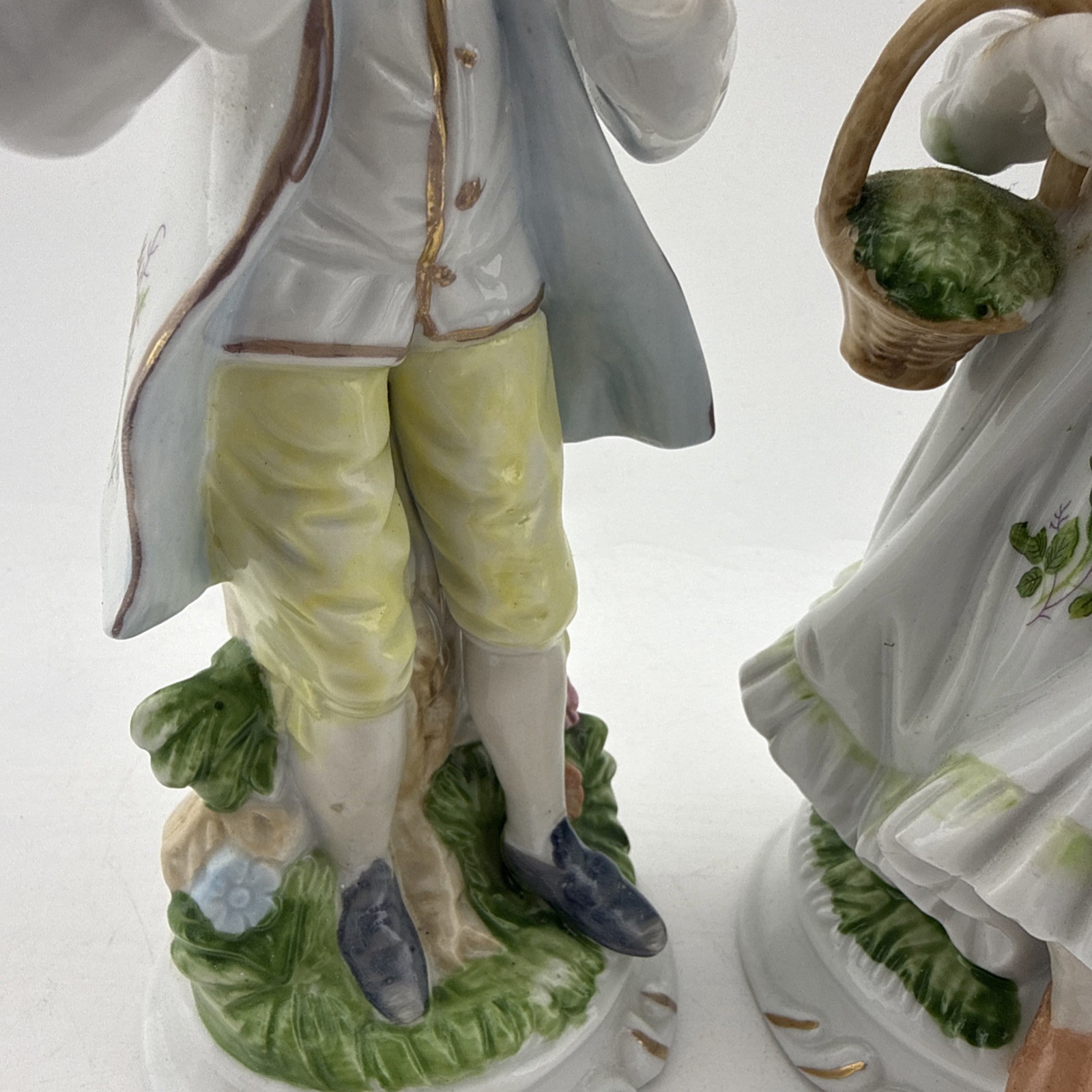 Vintage Colonial Porcelain Couple Figurines Man Bird Woman Basket