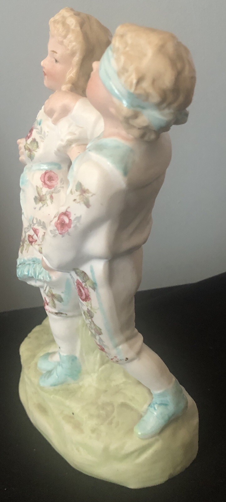 German Heubach Bisque Blind Man’s Bluff Figurine Painted Red Roses 7 3/4