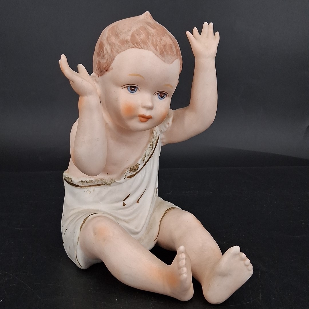 Vintage 7.5″ Porcelain Piano Baby Figurine Brown Hair Blue Eyes 11/788 Unmarked